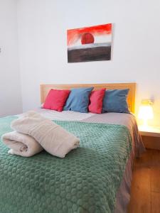 Ένα ή περισσότερα κρεβάτια σε δωμάτιο στο Madrid Homely Apartment