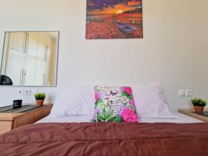 Letto o letti in una camera di Kalogria Beach Apartments