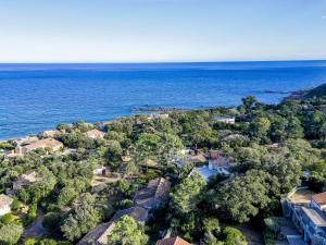 an aerial view of a house by the ocean at Holiday Home Casa Samba by Interhome in Sainte-Lucie de Porto-Vecchio