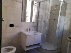Koupelna v ubytování Casa Di Francesco + 8 fotografií