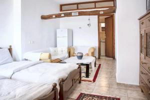 Postel nebo postele na pokoji v ubytování Spacious house with sea view in Volos