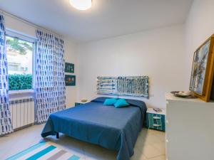 Un pat sau paturi într-o cameră la Apartment Casa e mare by Interhome