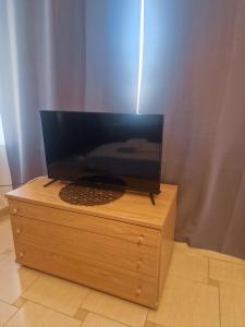 TV o dispositivi per l'intrattenimento presso Kalogria Beach Apartments