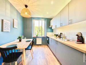 Kuchyň nebo kuchyňský kout v ubytování Appartements à Lorient - Tout confort - Internet Fibre - NOUVEAU
