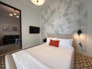 Voodi või voodid majutusasutuse Patio Elba Boutique Hotel toas
