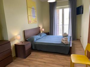 Ένα ή περισσότερα κρεβάτια σε δωμάτιο στο Miro' Agropoli