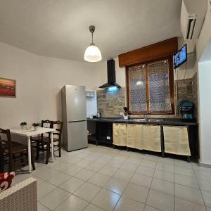 Kuchyň nebo kuchyňský kout v ubytování Corteantica RHO-FIERA by Rhospitality + 23 fotografií