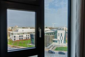 Byggingin sem stúdentagarðurinn er í