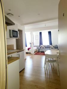 Η κουζίνα ή μικρή κουζίνα στο Appartement de charme +4 φωτογραφίες