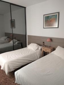 Postel nebo postele na pokoji v ubytování Un lujazo de piso en el centro de Calafell