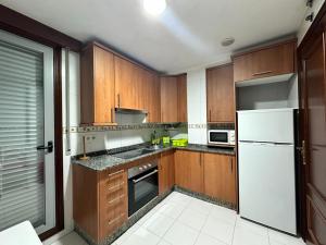 O bucătărie sau chicinetă la Apartamento en Torrecedeira 3 dormitorios