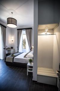 Ліжко або ліжка в номері San Pietro Leisure and Luxury