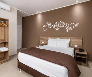 Voodi või voodid majutusasutuse Hotel Solec Piura toas