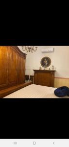 Posteľ alebo postele v izbe v ubytovaní La Maiolica