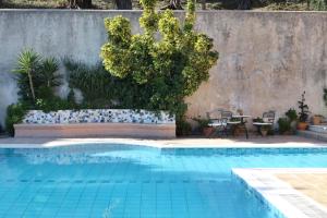 Bazén v ubytování Casa T with amazing views in Corfu nebo v jeho okolí