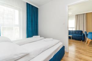 Posteľ alebo postele v izbe v ubytovaní Letnica - Seaside Apartment 2 by Grand Apartments