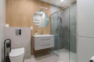 Kúpeľňa v ubytovaní Letnica - Seaside Apartment 2 by Grand Apartments + 3 fotografie