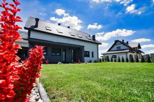 Vonkajšia záhrada v ubytovaní Apartamenty Izabell by Housine