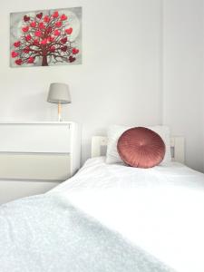 Posteľ alebo postele v izbe v ubytovaní Apartamenty Izabell by Housine