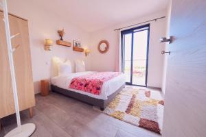 Llit o llits en una habitació de Villa avec jardin et piscine