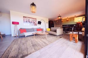 Posezení v ubytování Villa avec jardin et piscine
