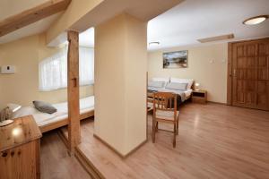 Posteľ alebo postele v izbe v ubytovaní Apartmany ZEA