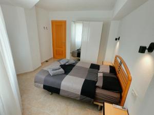 Postel nebo postele na pokoji v ubytování La Linea