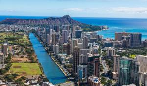 an aerial view of a city with a body of water at Free parking Comfy central Waikiki in Honolulu
