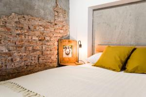 Postel nebo postele na pokoji v ubytování Narnia LOFT