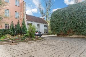 a car parked in front of a house at Vilnius Old Town apartment in Vilnius
