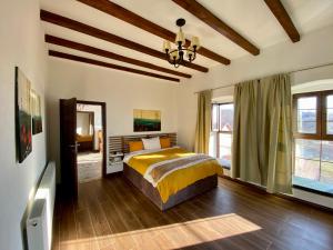 Ένα ή περισσότερα κρεβάτια σε δωμάτιο στο The Old School