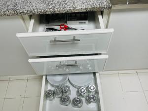 Kuchyň nebo kuchyňský kout v ubytování SG Homes