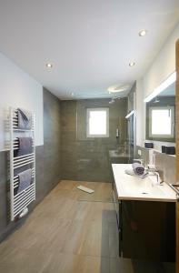 a bathroom with a sink and a shower at Apartment Lina in Gröbming