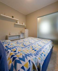 Venere - Sanremo Apartmentsにあるベッド