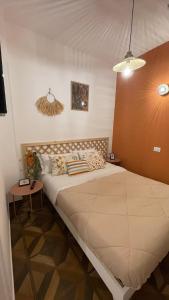 A bed or beds in a room at Santa Lucia Affittacamere