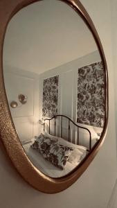 A bed or beds in a room at Santa Lucia Affittacamere