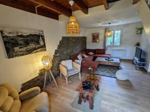 Χώρος καθιστικού στο La Bigourdane Grand gîte confortable & Spa