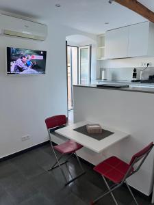 Kuchyň nebo kuchyňský kout v ubytování Petit Studio vue mer
