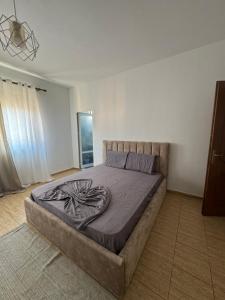 Posteľ alebo postele v izbe v ubytovaní Koa Apartment