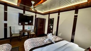 Postel nebo postele na pokoji v ubytování Golden Residency