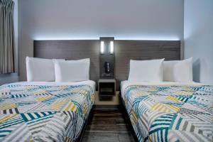 Postel nebo postele na pokoji v ubytování Motel 6-Richland, WA - Kennewick
