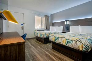 Postel nebo postele na pokoji v ubytování Motel 6-Richland, WA - Kennewick + 37 fotografií