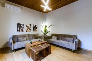 Część wypoczynkowa w obiekcie Erotokritos Deluxe Suite With Jacuzzi