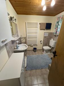 Koupelna v ubytování Ferienhaus Axmann + 18 fotografií
