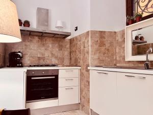 Cucina o angolo cottura di Questa casa non è un albergo