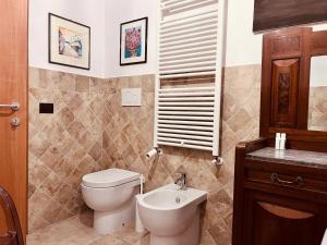 Bagno di Questa casa non è un albergo