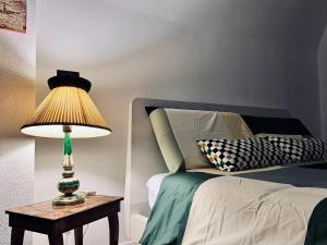Letto o letti in una camera di Questa casa non è un albergo