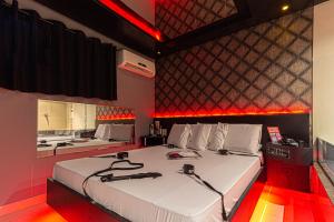 Postel nebo postele na pokoji v ubytování Point Motel GRU