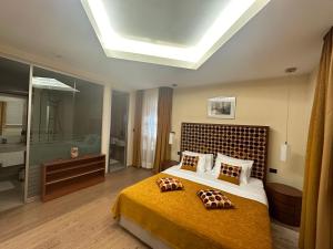 Postel nebo postele na pokoji v ubytování Zigante Rooms