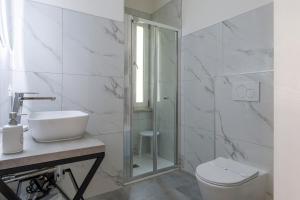 Koupelna v ubytování Shiny Rooms Verona